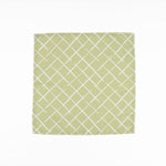 Light green cloth dinner napkins featuring a delicate white lattice pattern for elegant table settings.
