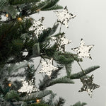 Silver spray of stars featuring sparkling glitter accents, perfect for festive Christmas trees and arrangements.