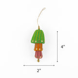 Colorful embellished felt lantern ornament featuring green, orange, and pink layers, measuring 4" by 2"