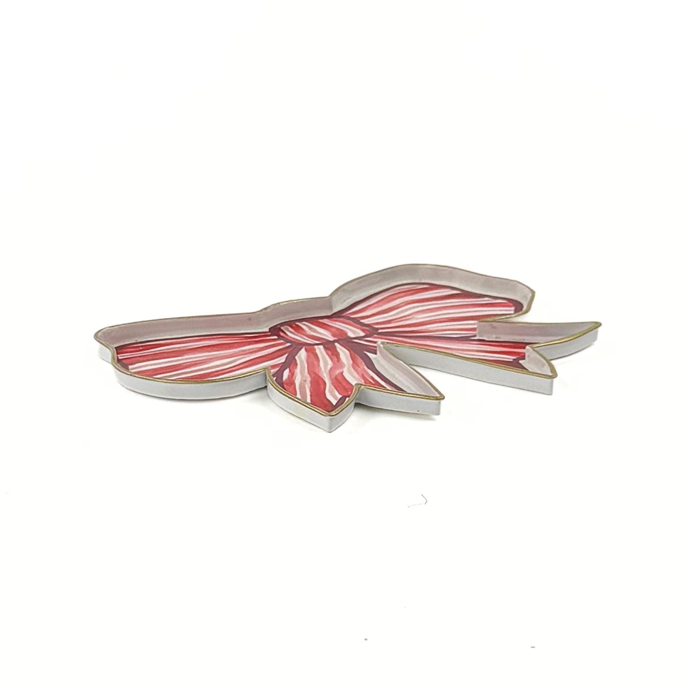 Red and white striped bow-shaped tray with gold edging displayed on a white background.