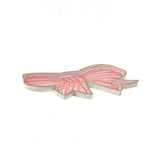 Flat view hand-painted tole tray featuring a delicate pink bow with white stripes and elegant gold trim on a white background