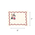 Elegant white cocktail napkins featuring red scalloped borders, colorful Christmas ornaments, holly, and festive embroidery with dimensions of 7" by 9"