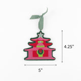 Felt chinoiserie pagoda Christmas ornament featuring pink, red, and green details, measuring 4.25" by 5"