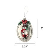 Snowman glass Christmas ornament featuring sparkling silver, red, and green accents, measuring 5" by 3.25"