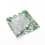 Folded Cloth dinner napkins featuring green Chinese dragon and pink floral prints with green ric rac trim.