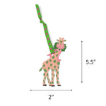 Hand-painted giraffe Christmas ornament featuring pink and green details, measuring 5.5" by 2"