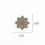 Green jeweled flower Christmas ornament featuring pink petals and gold accents, measuring 3.75" by 3.75"