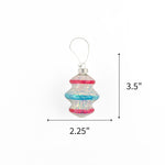 Patriotic tinsel glass ornament featuring shimmering red, blue, and silver accents, measuring 3.5" by 2.25"