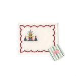 Elegant white cocktail napkins featuring red scalloped borders, colorful Christmas pagodas, festive trees, and embroidery.