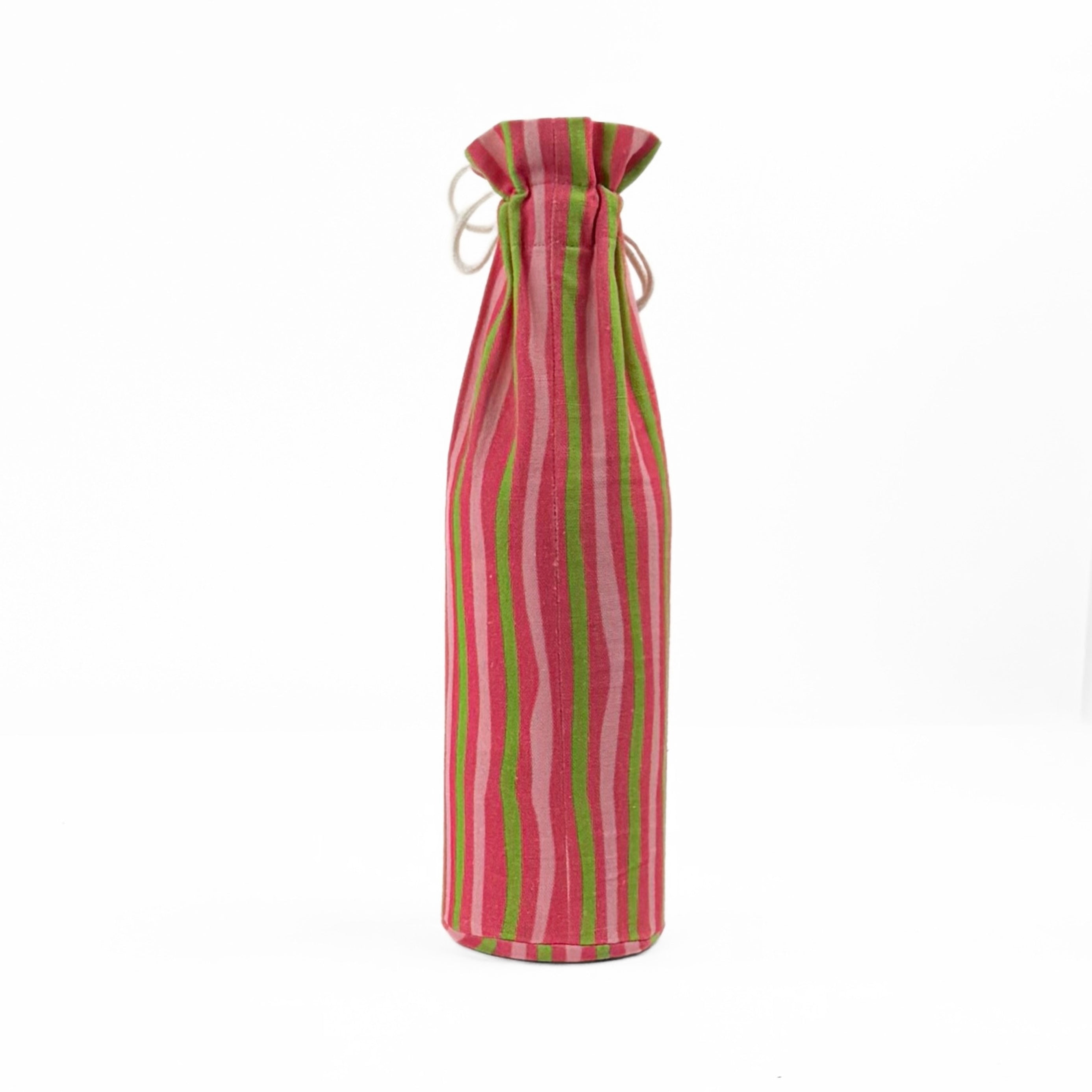 back of pink and green striped wine bag with “Let’s get jolly!” printed on the front