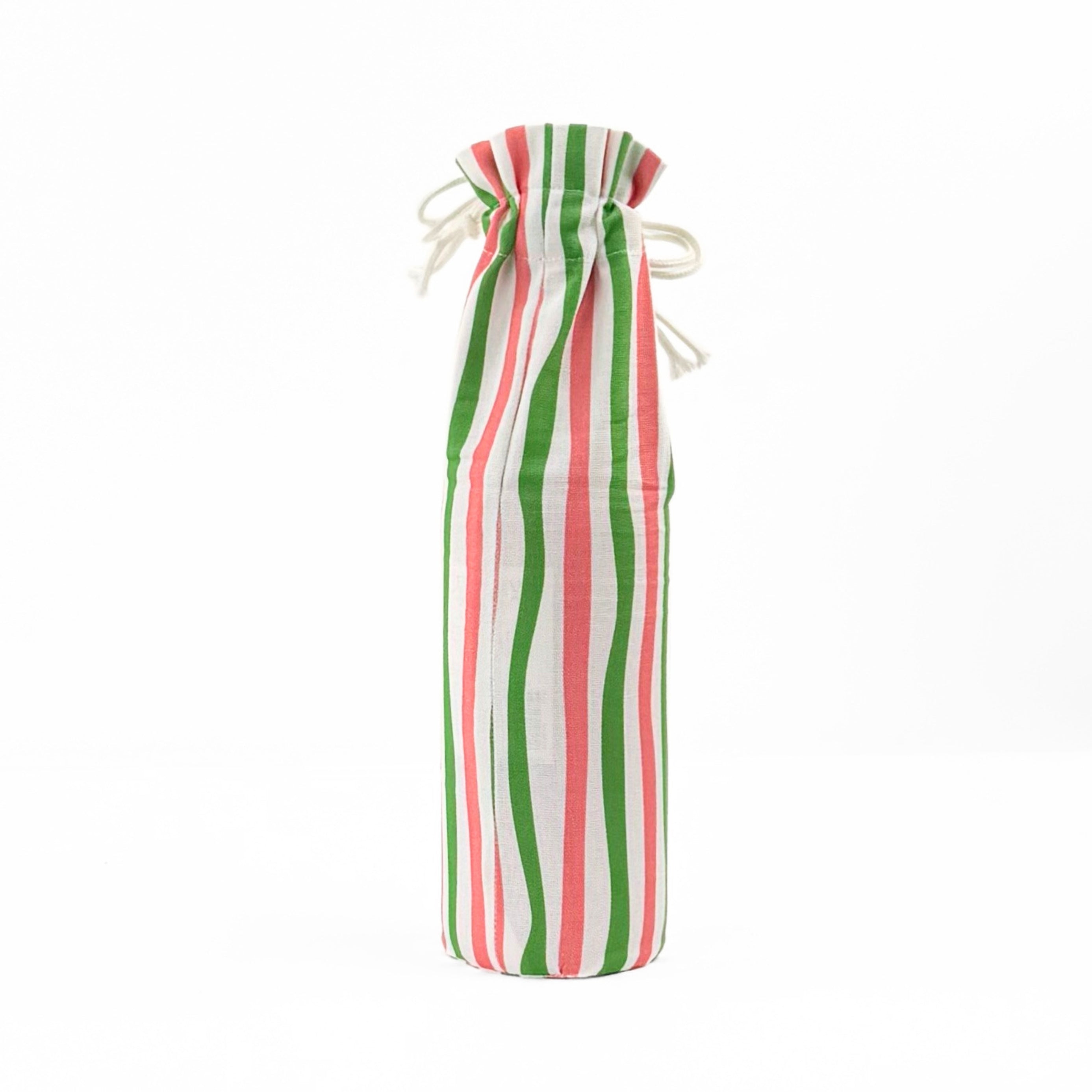 Back of pink, green, and white striped wine bag with “Liquid Mistletoe” printed on the front