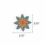 Blue jeweled flower Christmas ornament featuring orange petals and pink accents, measuring 3.75" by 3.75"