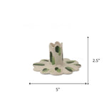 Green scalloped candle holder with dimension of 5" x 2.5".
