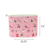 Large Festive pink Christmas caddy featuring nutcrackers, swans, Christmas trees, gifts, and whimsical ribbon patterns with dimensions of 5" by 7.5" by 10.75"