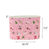 Large Festive pink Christmas caddy featuring nutcrackers, swans, Christmas trees, gifts, and whimsical ribbon patterns with dimensions of 5" by 7.5" by 10.75"