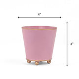 Bright  light Pink small tole metal cachepot with gold base and trim on a white background with 4'' x 4'' dimension