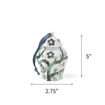 Elegant ginger jar ornaments featuring intricate floral patterns in white and green with ribbons with dimensions of 5" by 2.75"
