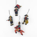 Charming felt patriotic soldier ornaments featuring miniature musicians, horseback riders, and colorful American colonial uniforms.