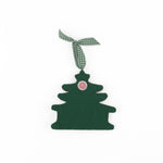 Back of pink felt chinoiserie christmas ornaments in the shape of pagodas against a white background 