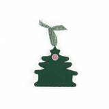 Back of pink felt chinoiserie christmas ornaments in the shape of pagodas against a white background 