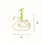 Hand-painted white swan Christmas ornament featuring gold detailing, measuring 4" by 5"