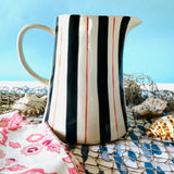 Hand-Painted Blue-and-Red Striped Stoneware Pitcher