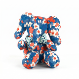 Floral-patterned elephant on a white background
