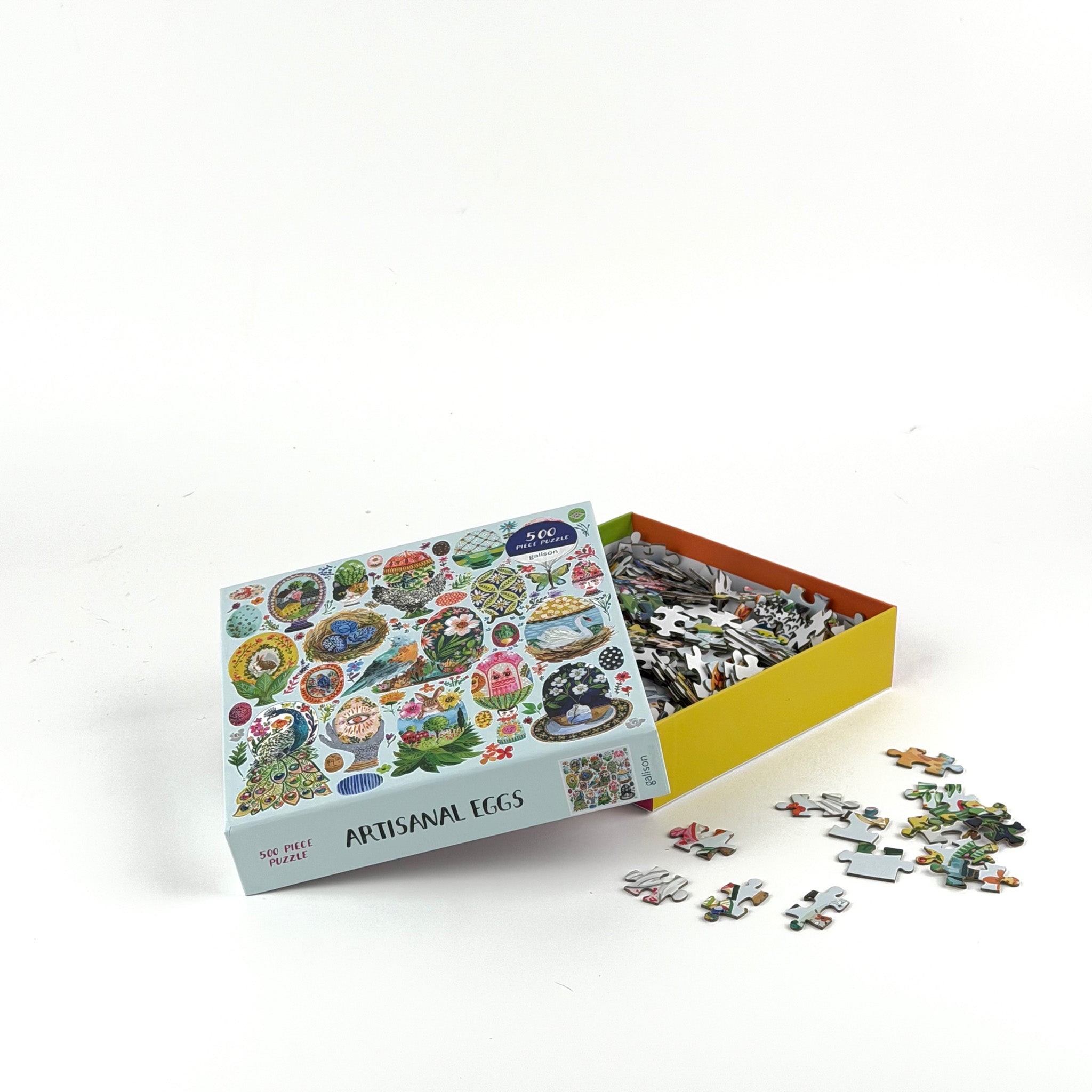 Opened 500 piece jigsaw puzzle with colorful artisanal egg illustrations