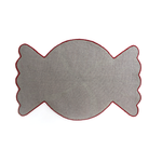 reverse/back of A Christmas rug in the shape of a wrapped red, white and pink candy. 