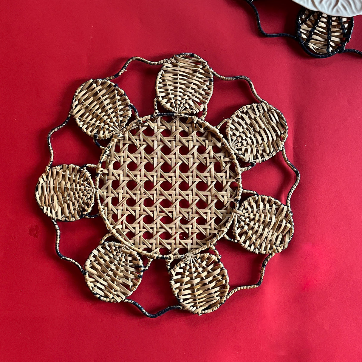 Rear view of the Shell placemat/charger in navy blue