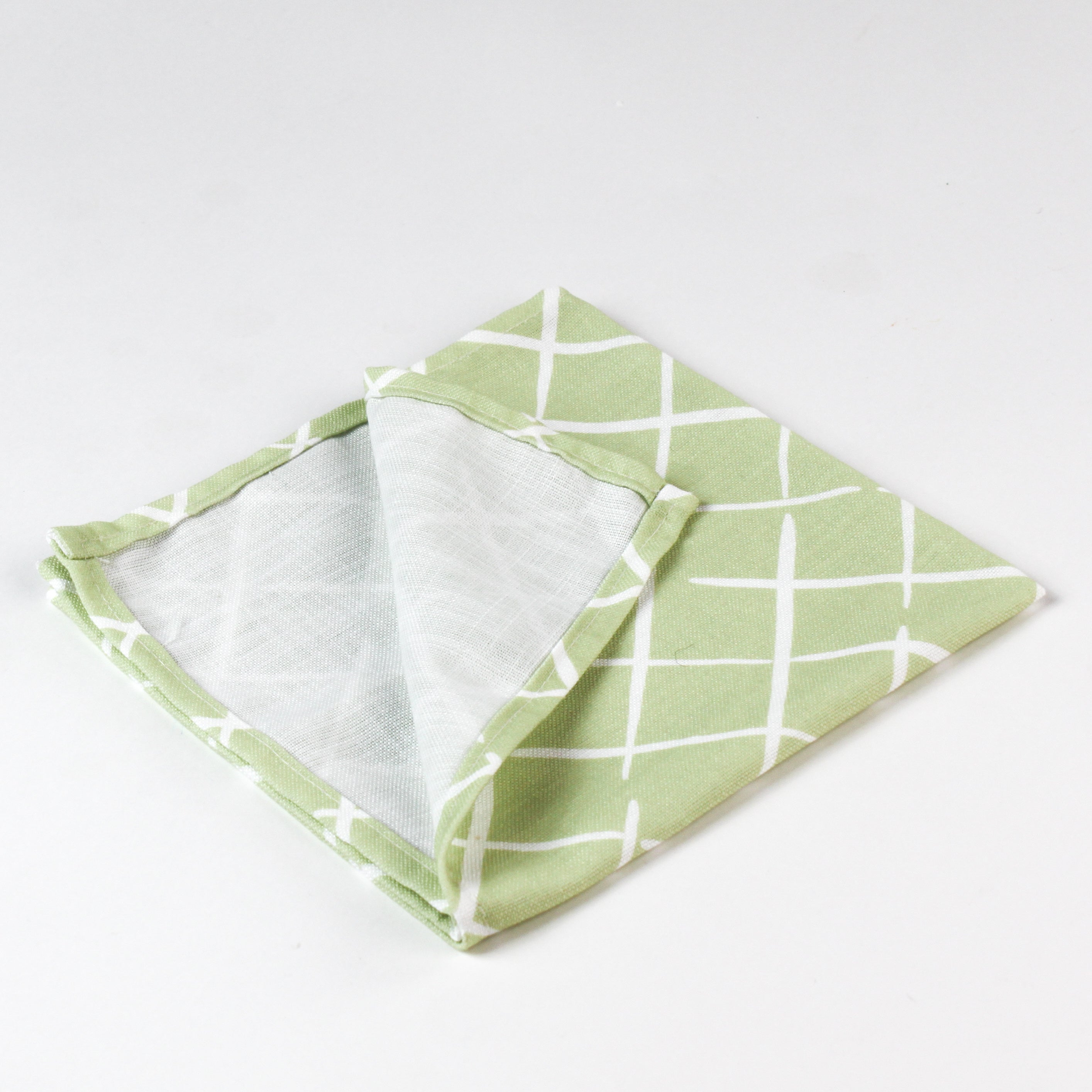 Back view of Bahama Court light green cloth dinner napkin showing fabric construction and inner lining