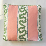 Bahama Court striped accent pillow with green pattern, blush pink panels, and decorative cord trim