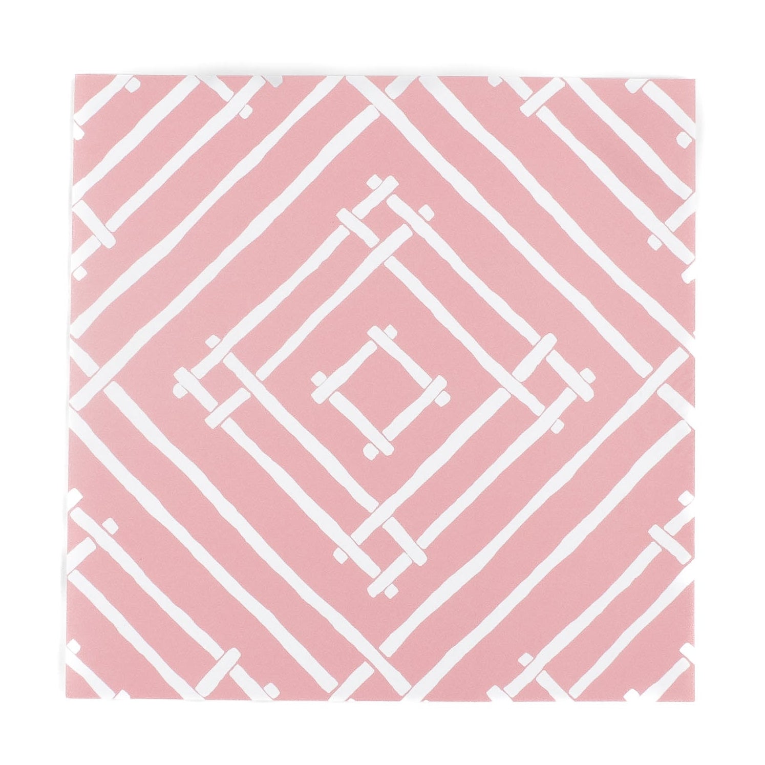pink paper placemats with a white bamboo design called Island house by Madcap Cottage
