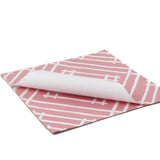 pink paper placemats with a white bamboo design called Island house by Madcap Cottage