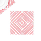 pink paper placemats with a white bamboo design called Island house by Madcap Cottage