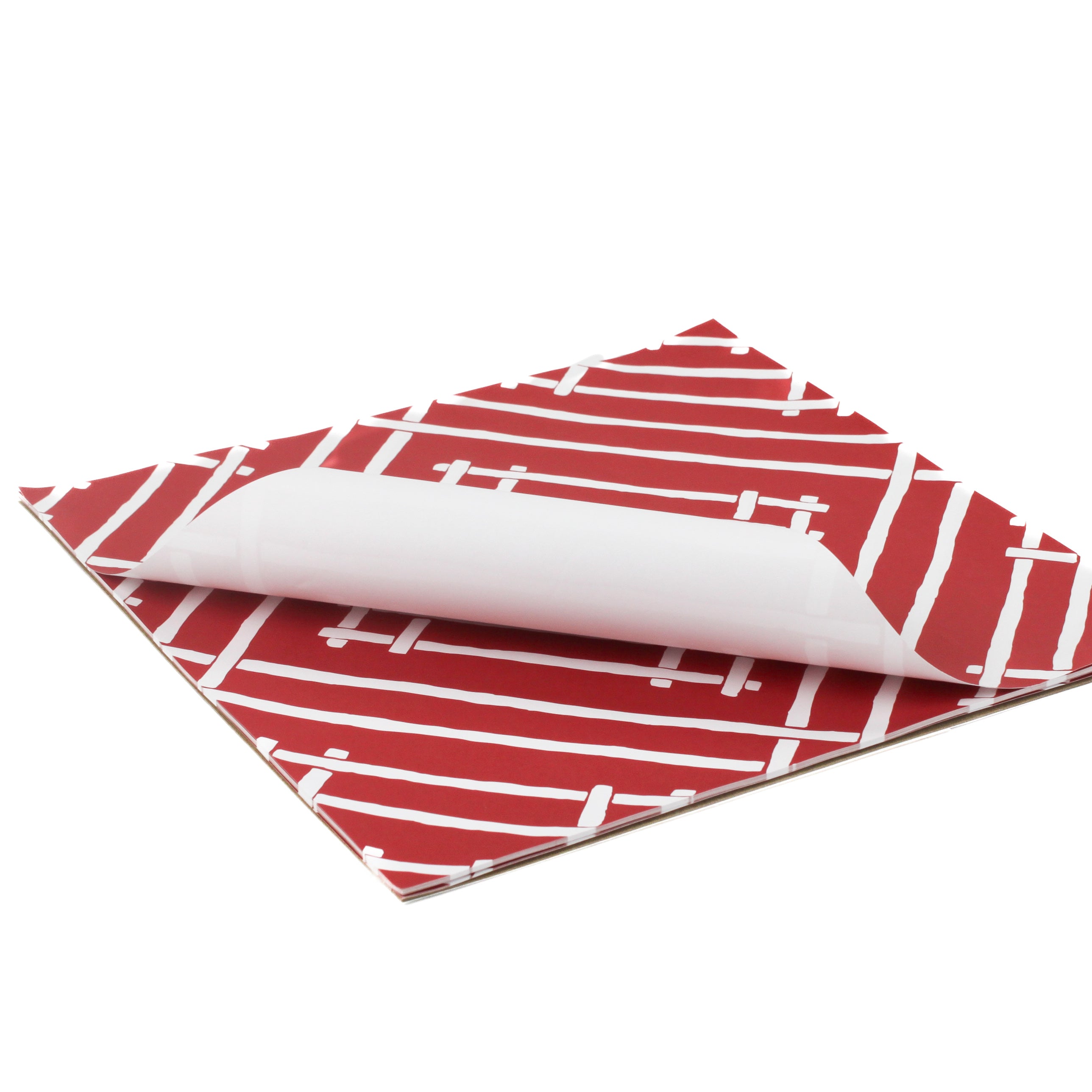 Island House square red paper placemats in a white background. 