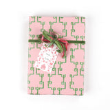 Gift wrapped in Bamboozled green and pink wrapping paper with ribbon and tag.