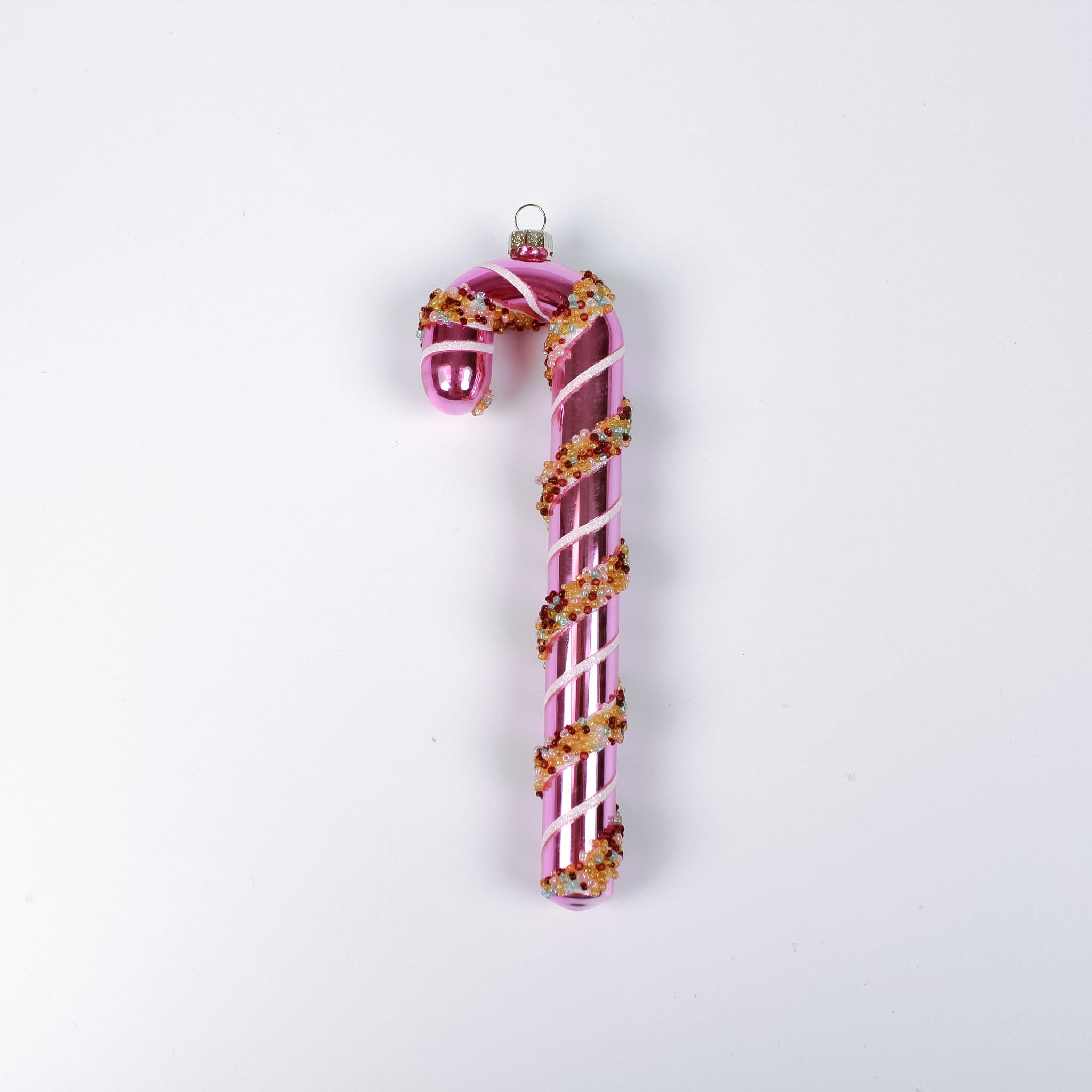 pink glass candy cane ornaments on a white background