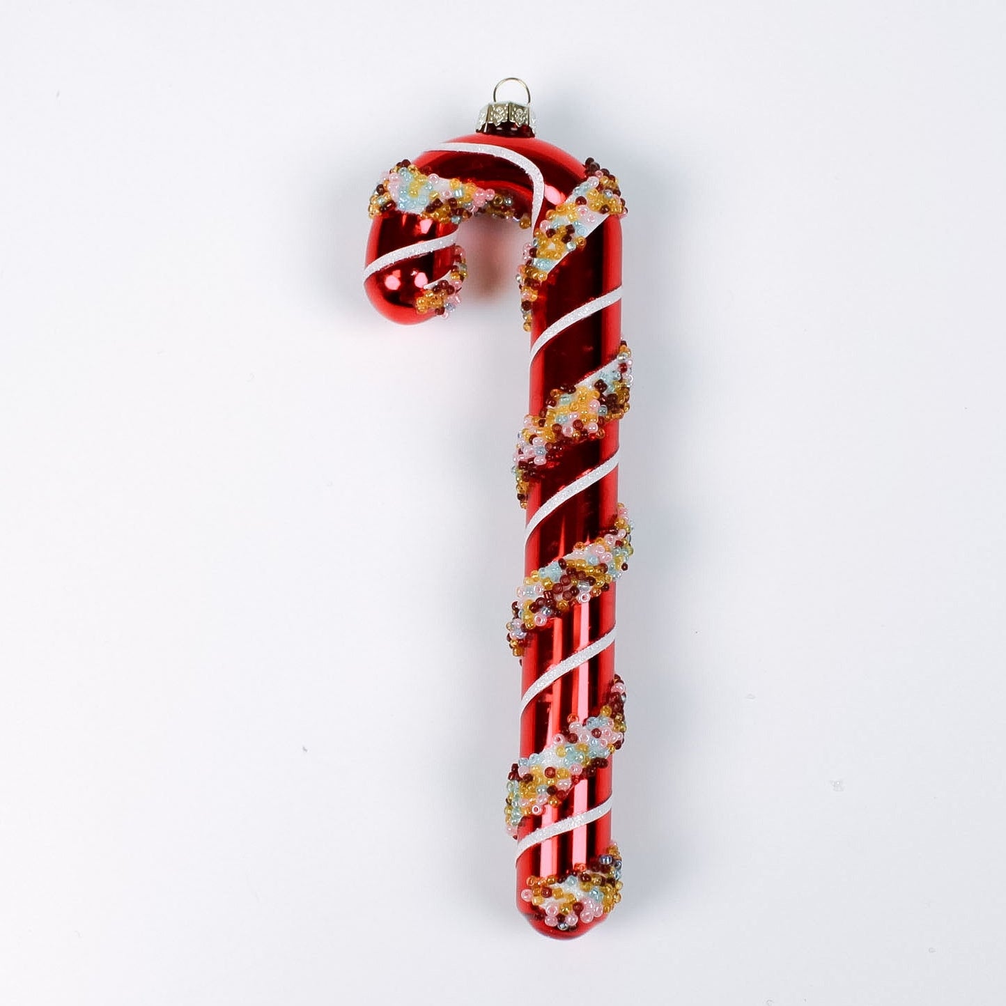 red glass candy cane ornaments on a white background