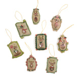 Set of decorative Christmas ornaments with reindeer designs on a white background