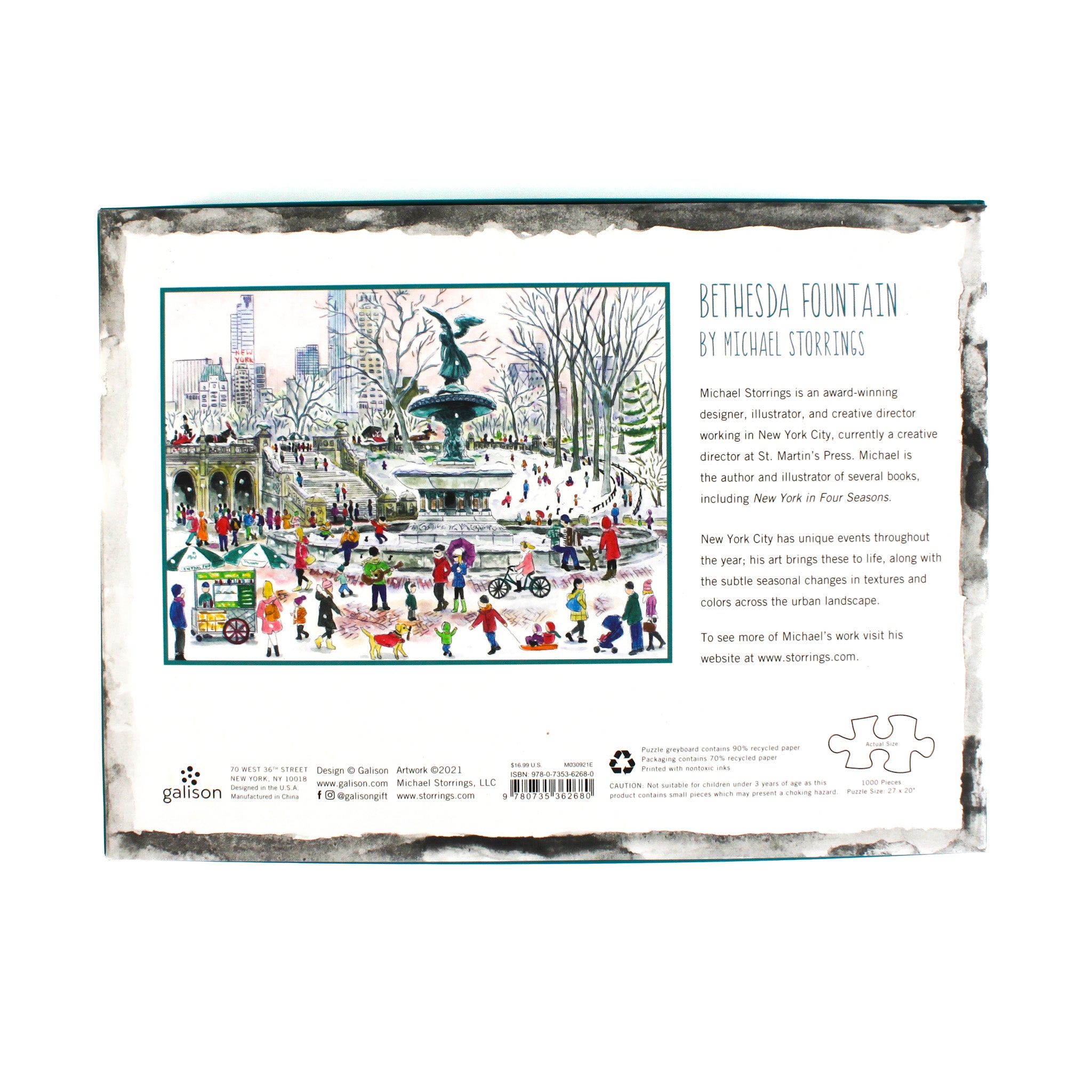 Back of Michael Storrings Bethesda Fountain jigsaw puzzle box showing winter Central Park illustration, artist bio, and product details.