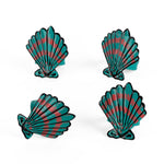 Blue and pink shell napkin rings featuring coastal-inspired seashell designs.