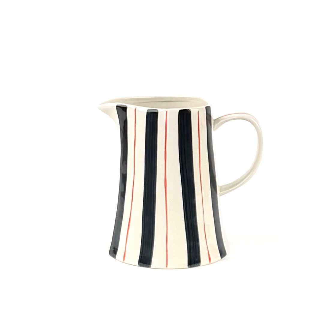 Blue and red striped pitcher with cream ceramic finish, curved handle, and hand painted vertical stripe design.