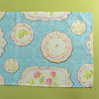 Society Hill Vintage Plates cloth table runner close-up in blue on a green background