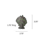 Brown and green shell napkin ring measuring 2.75 inches wide and 3.25 inches high with 1.75 inch ring.