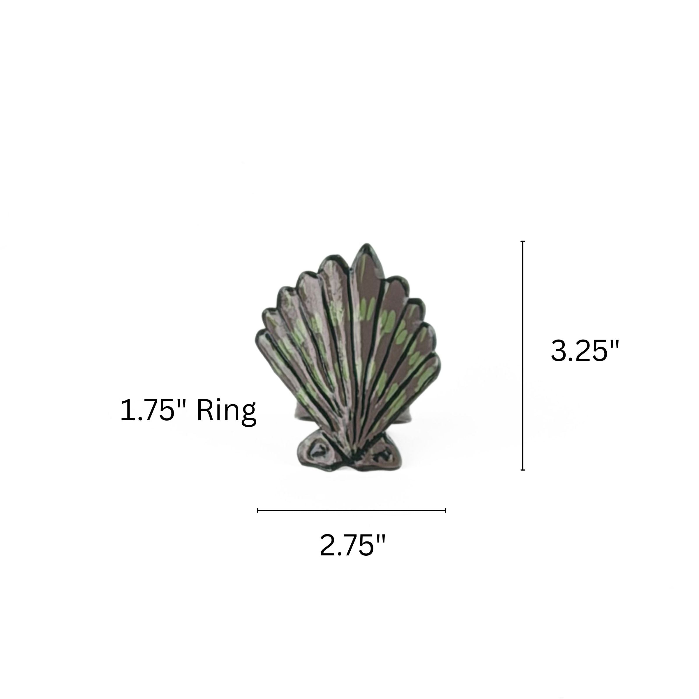 Brown and green shell napkin ring measuring 2.75 inches wide and 3.25 inches high with 1.75 inch ring.