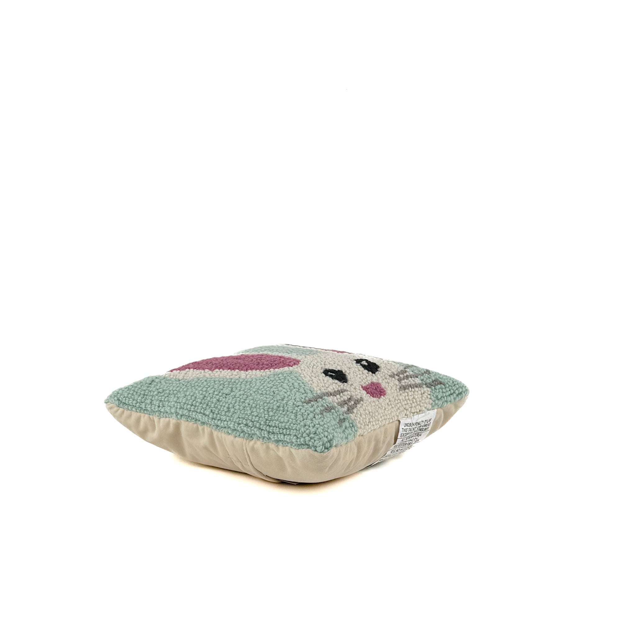 bunny face hooked pillow with soft textured design on white background