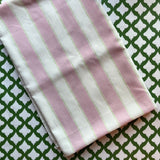 Cabana Boy lavender striped cloth tablecloth with green dashed lines on a white background.