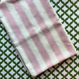 Cabana Boy lavender striped cloth tablecloth with green dashed lines on a white background.