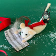 A felt Christmas decoration of a mouse writing a christmas carol with a feather quill and holding a black lantern with its tail